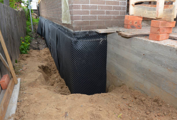 SJ Waterproofing Pros technician performing targeted Sump Pump Installation assessment in Kellnersville, WI